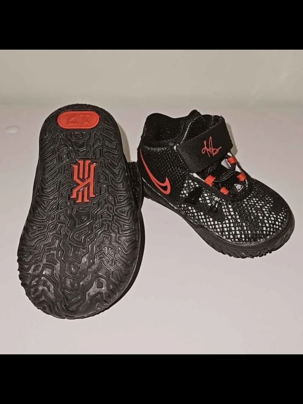 Nike Kids Black Sneakers with Red Accents